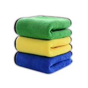 Stack of colorful microfiber cleaning cloths neatly folded on a white background