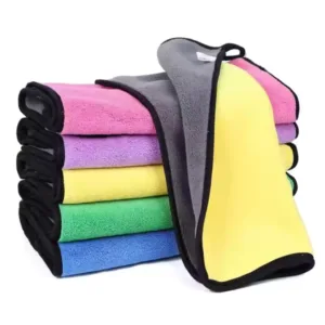Microfiber towel in light blue, soft texture, perfect for cleaning and polishing surfaces.
