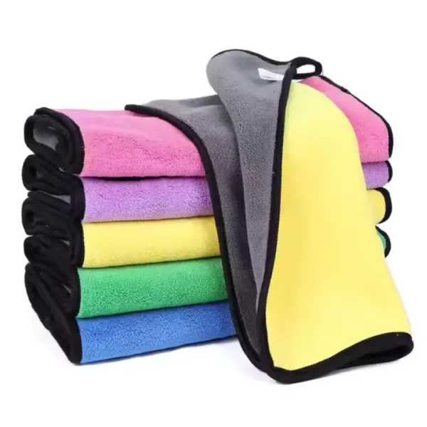 Microfiber towel in light blue, soft texture, perfect for cleaning and polishing surfaces.