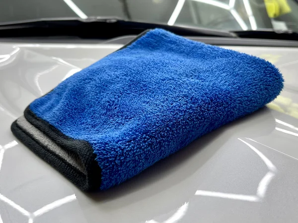 Microfiber towel used to clean a car's dashboard