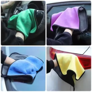 Soft microfiber towel used for car dusting and cleaning, safe on paint and glass surfaces